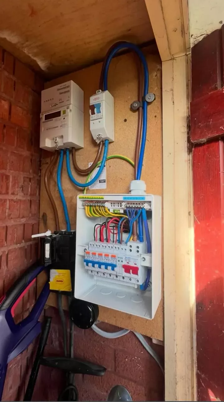 A new consumer unit fitted in an under-stairs cupboard